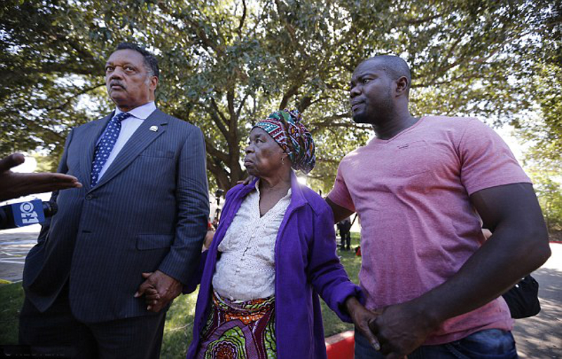 Anger at the hospital: Nowai Korkoyah, the mother of Thomas Eric Duncan, the first patient diagnosed with Ebola on U.S. soil, pictured with Reverend Jesse Jackson (left) in Dallas, Texas just before her son died.