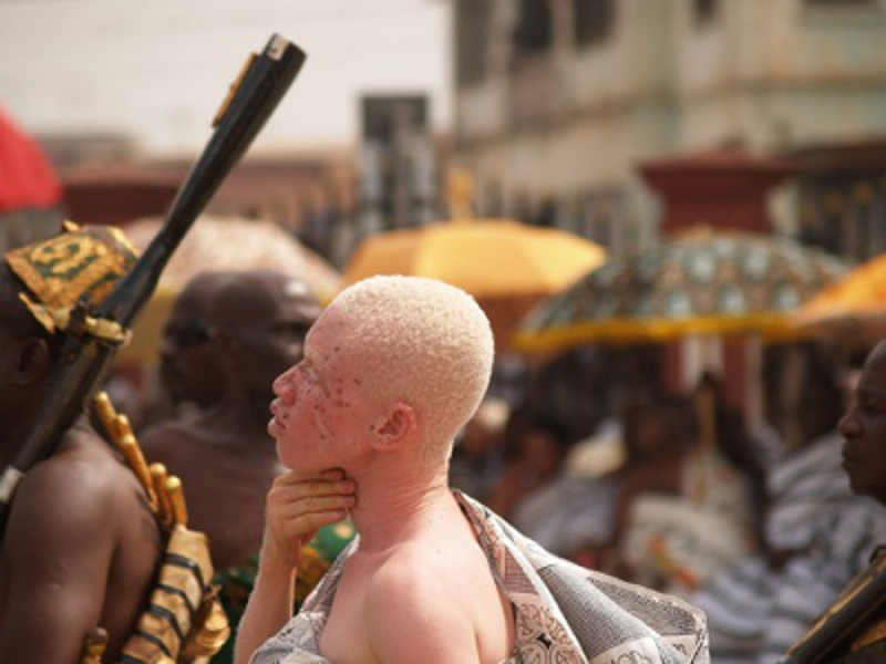An albino Royal in procession with his Akan Chieftaincy retinue.