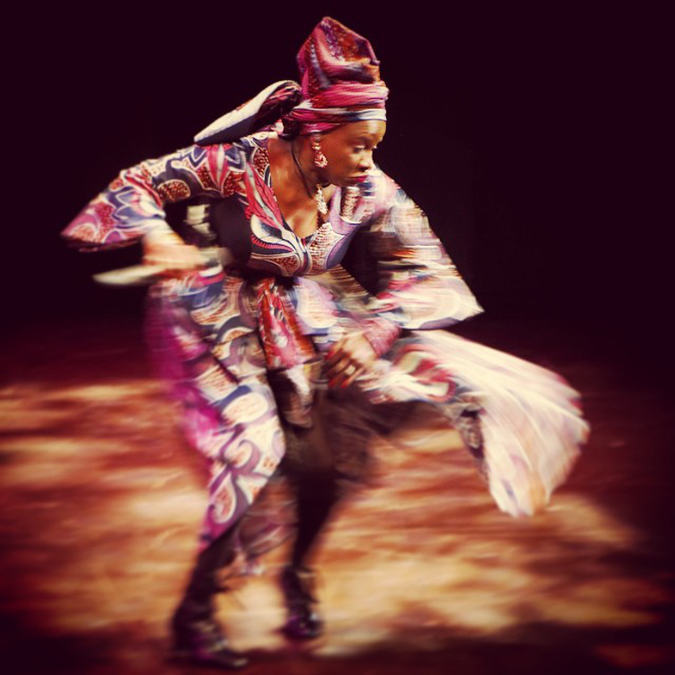 Angélique Kidjo Doing a traditonal Dahomey war Dance - Atsiagbekor.