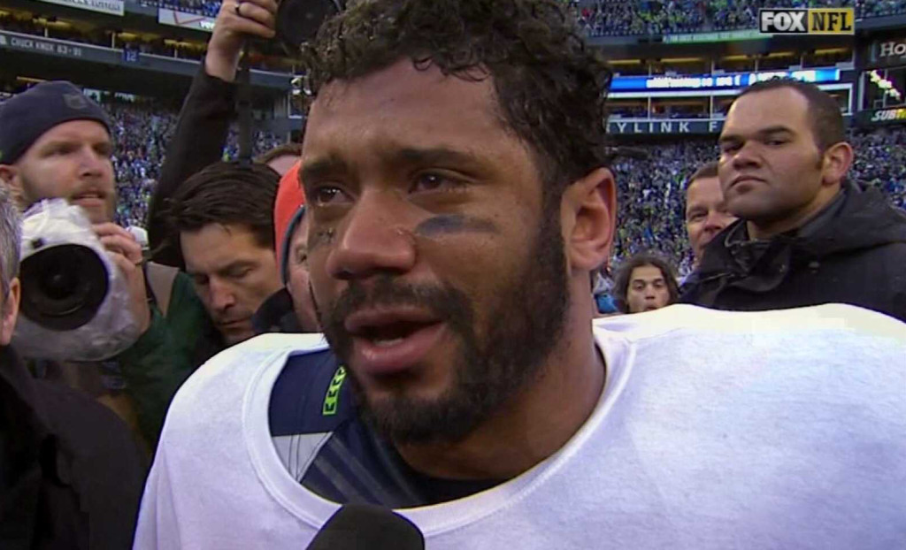 Russell Wilson breaks down crying after win over Aaron Rodgers and the Green Bay Packers.