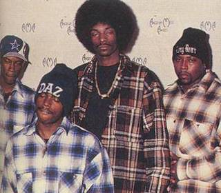 Plaid shirt fashion in 1990s rap.