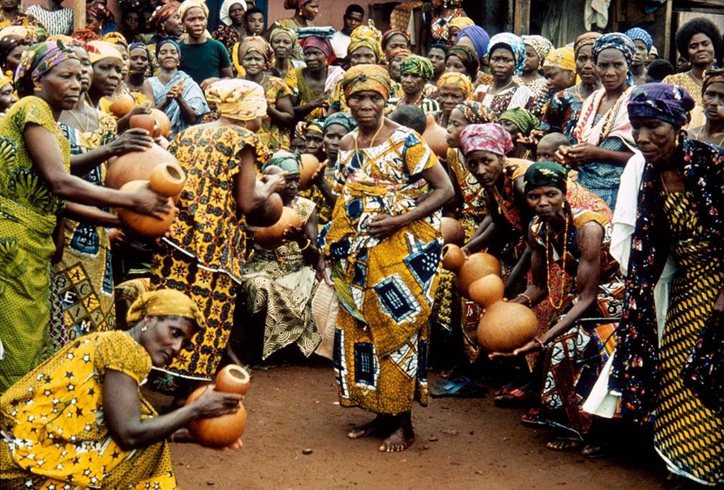 Ghanaian women at the Traditional Odwira festival making music and keeping a dying tradition alive. 
